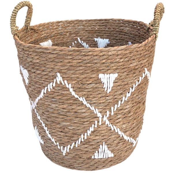 Woven seagrass basket with white geometric embroidery and handles.