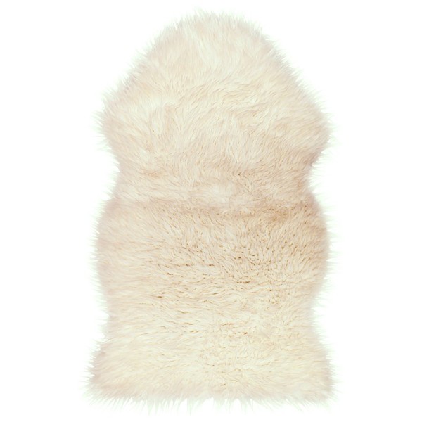 Classically shaped white sheepskin rug made of soft and luxurious faux fur.