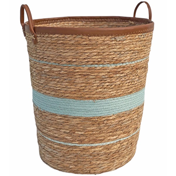 Round laundry basket made from seagrass with blue stripes and faux leather handles.