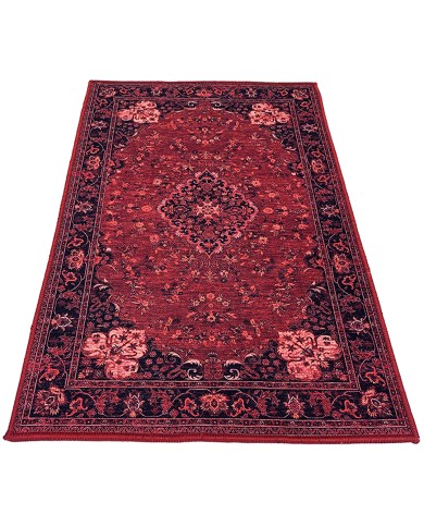 Traditional red Persian rug with intricate floral patterns and central diamond motif.