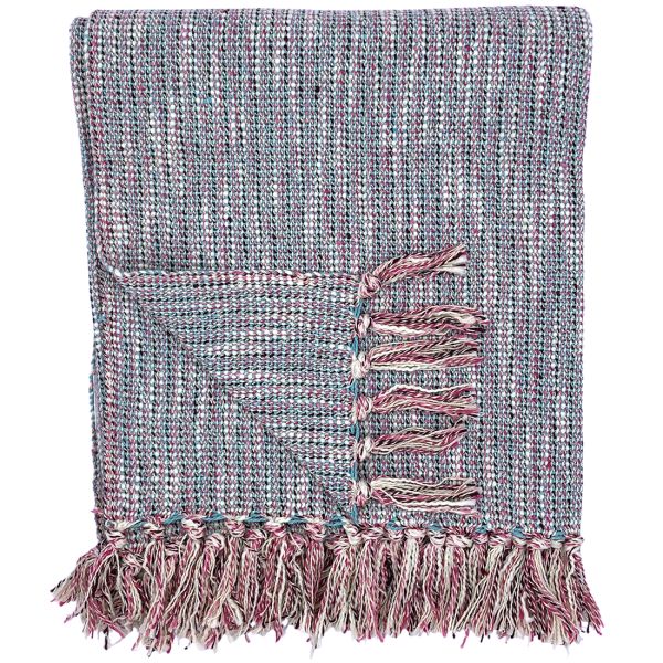 A folded woven cotton throw blanket with tassels on the edges.