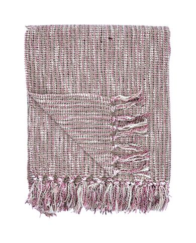 A folded woven pink throw blanket with tassels on the edges.