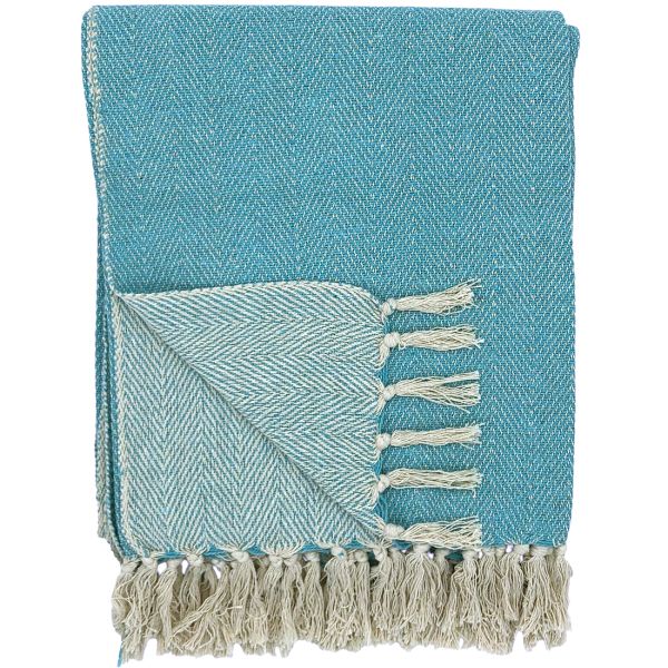 A folded blue throw blanket with a herringbone pattern and white tassels.