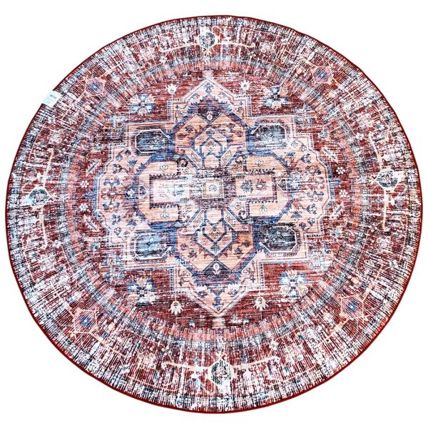 Round vintage rug with intricate blue and dark orange patterns on a neutral background.