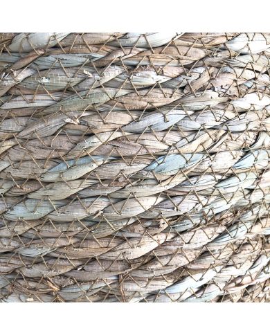 Close up of the woven seagrass from a seagrass waste paper basket.