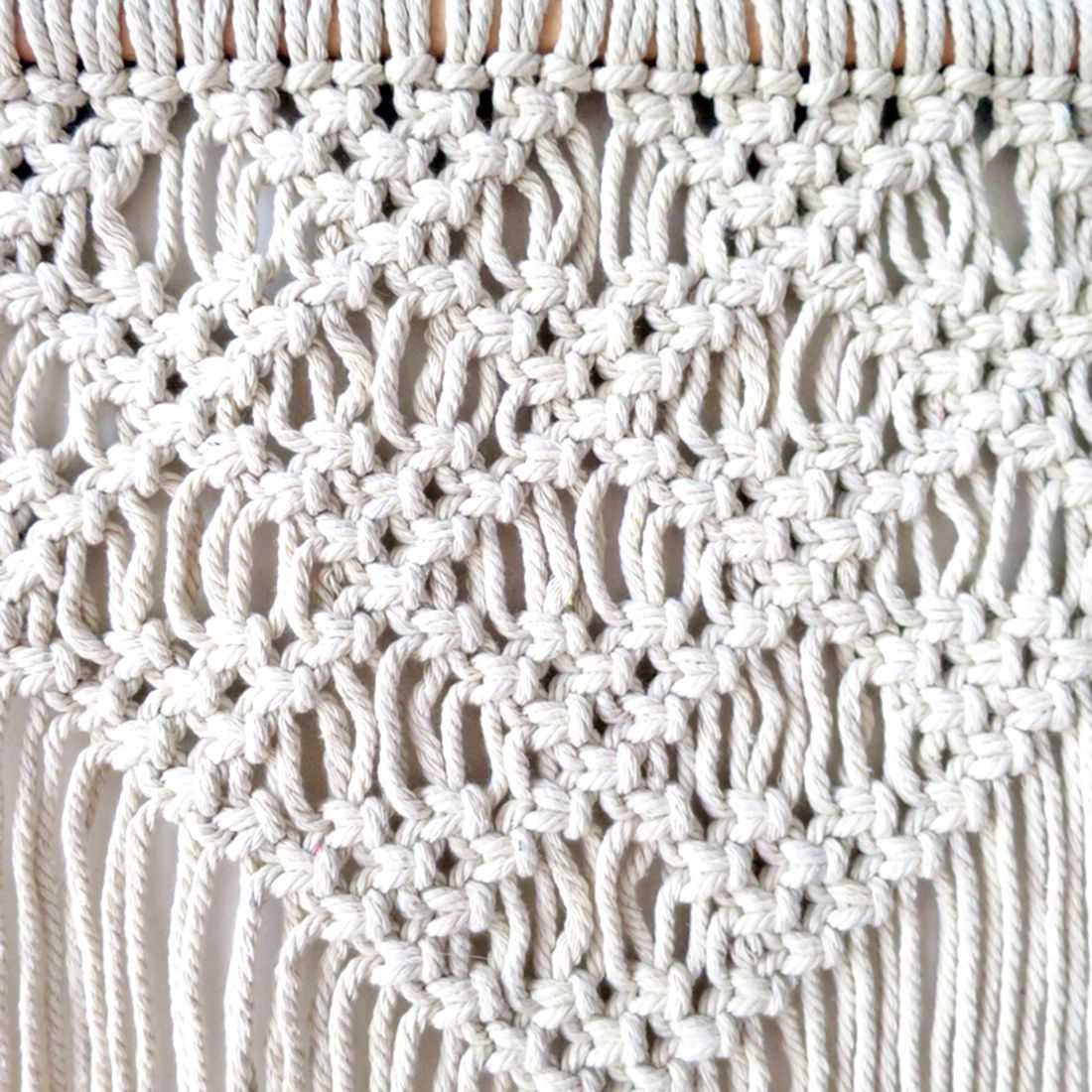 Details of the knot-work of the macramé wall hanger.