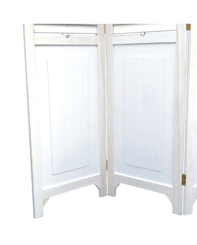 Close up of the bottom half of a whitewash room divider. Close up of the bottom half of a whitewash room divider.