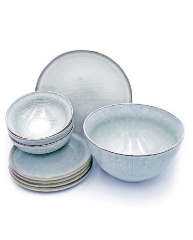 A stack of plates and poké bowls, featuring a Nordic grey glaze and contrasting vertical white lines.