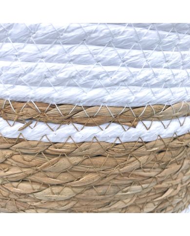 Close up of the two-tone woven seagrass from a seagrass waste paper basket.