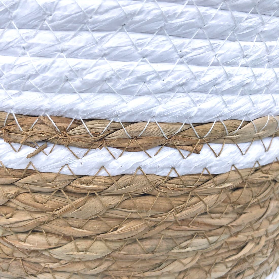 Close up of the two-tone woven seagrass from a seagrass waste paper basket.