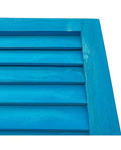 Close up of the blue wooden shutters highlighting the fixed slats. Close up of the blue wooden shutters highlighting the fixed slats.