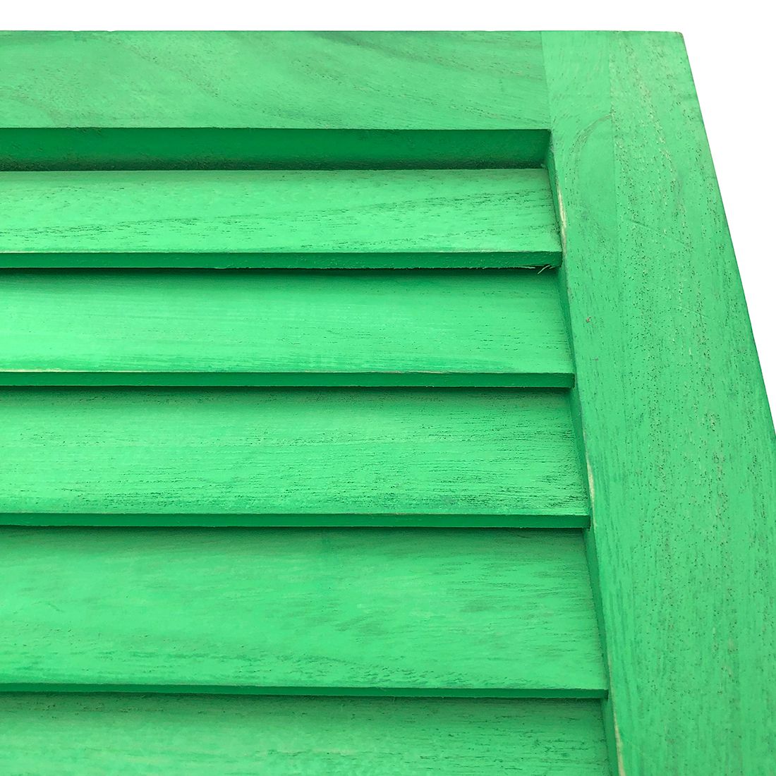 Close up of the green wooden shutters highlighting the fixed slats.