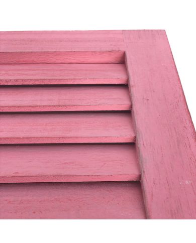 Close up of the pinkwash wooden shutters highlighting the fixed slats. Close up of the pinkwash wooden shutters highlighting the fixed slats.