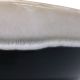 A close-up of the reactive glaze detail of the retro salad dish.