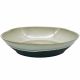 Two-tone large serving dish with a smooth beige interior and a contrasting black base.
