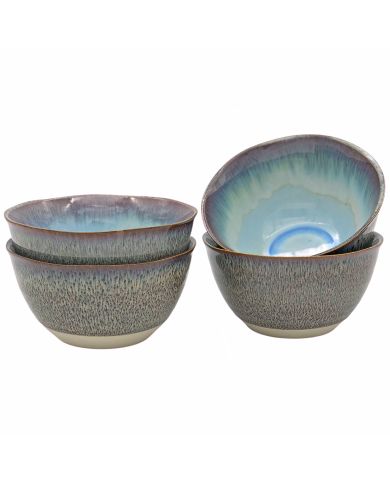 Four ceramic ramen bowls in a gradient of blue and grey, stacked and one tilted to reveal its interior.