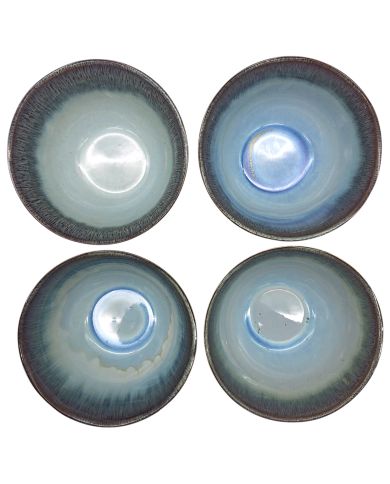 Top view of the ceramic ramen bowls with varying shades of blue and green interiors.