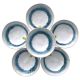 A circular arrangement of six ceramic tapas bowls with a speckled blue interior.