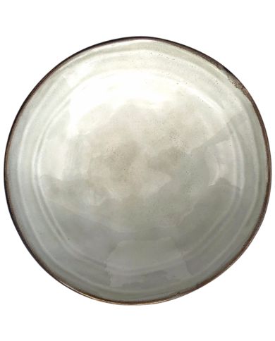 Top view of grey tapas bowl with a glossy finish and a rustic edge.