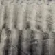 Close up of the silver grey faux fur throw blanket.