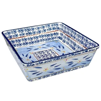 Vierkante ovenschaal met gedetaileerde blauwe en gele bloemmotieven.
