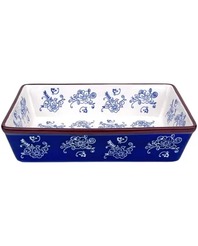 Rechthoekige ovenschaal wit met blauwe bloemmotieven en een bruine rand.