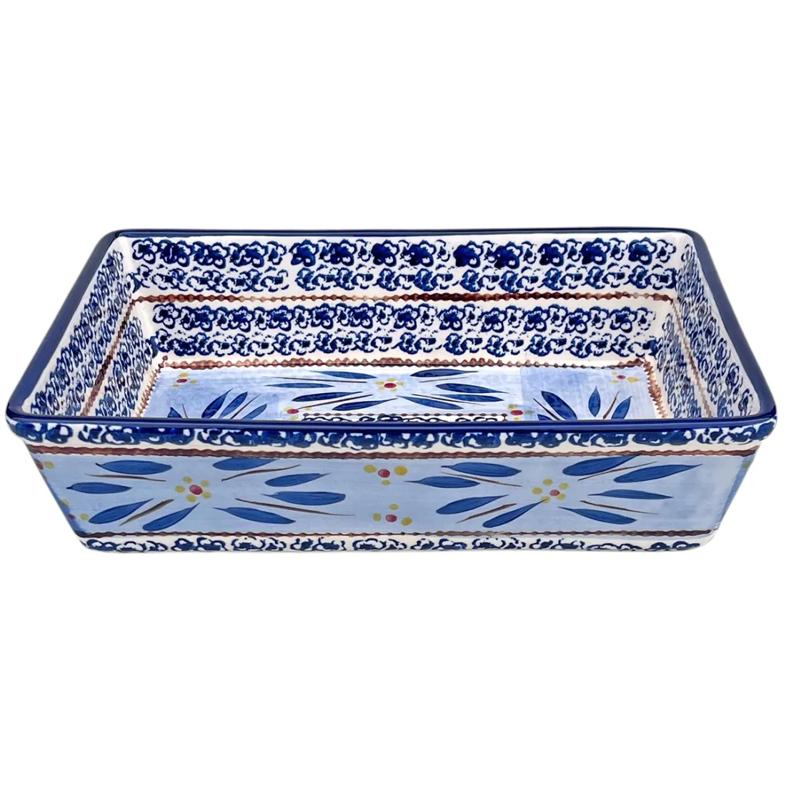 Rectangular ceramic oven dish with intricate blue and yellow floral patterns on a white background.