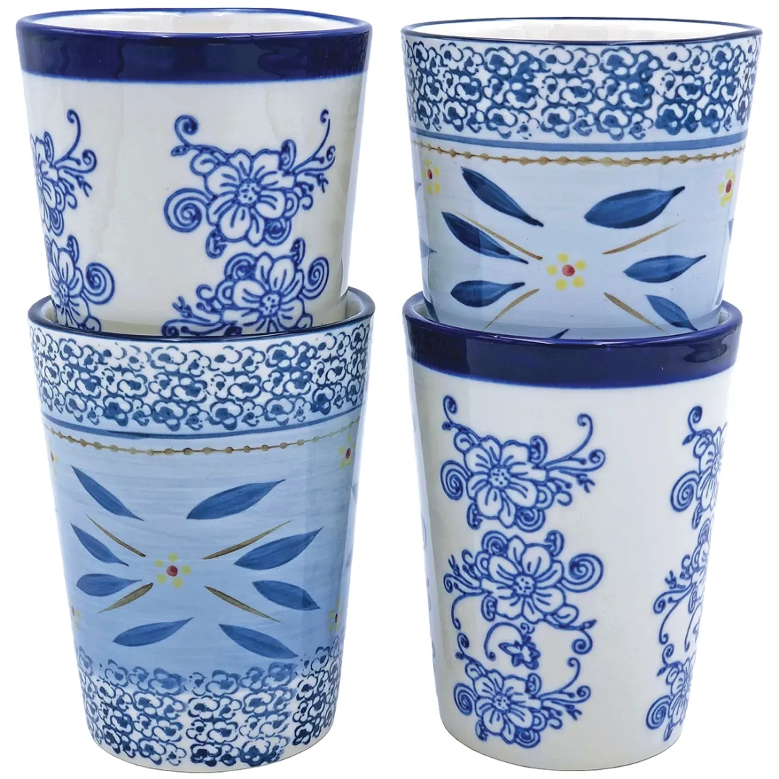 Four decorative tall tea mugs with intricate blue floral and leaf patterns stacked in two groups.