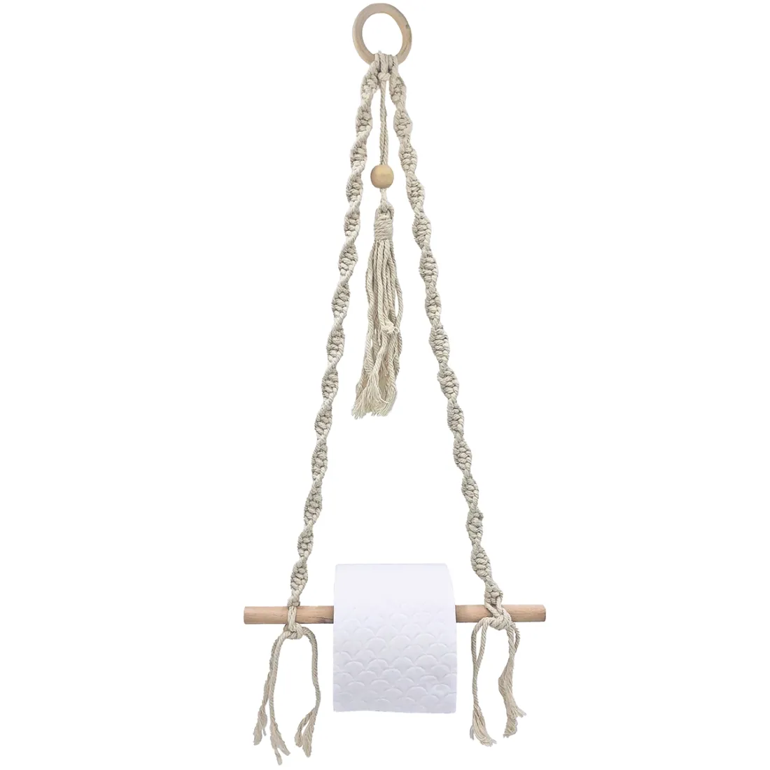 Macramé hanging toilet roll holder featuring a wooden rod, with a white toilet paper roll and decorative tassels.