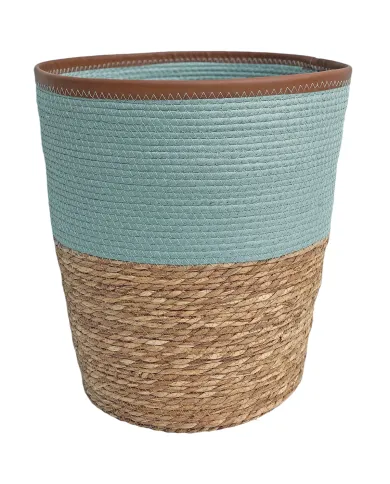 Blue laundry basket made from seagrass with an eggshell blue top and natural-tone bottom.