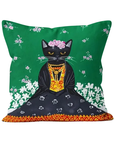 A green cat cushion featuring a Frida Kahlo style black cat adorned with flowers and traditional clothes.