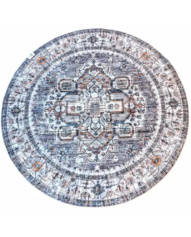 Round grey rug with intricate grey and blue patterns on a faded background.