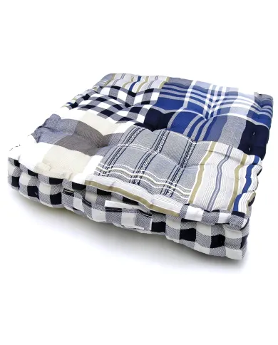 Box cushion in a pattern of blue stripes and checks with a handle.