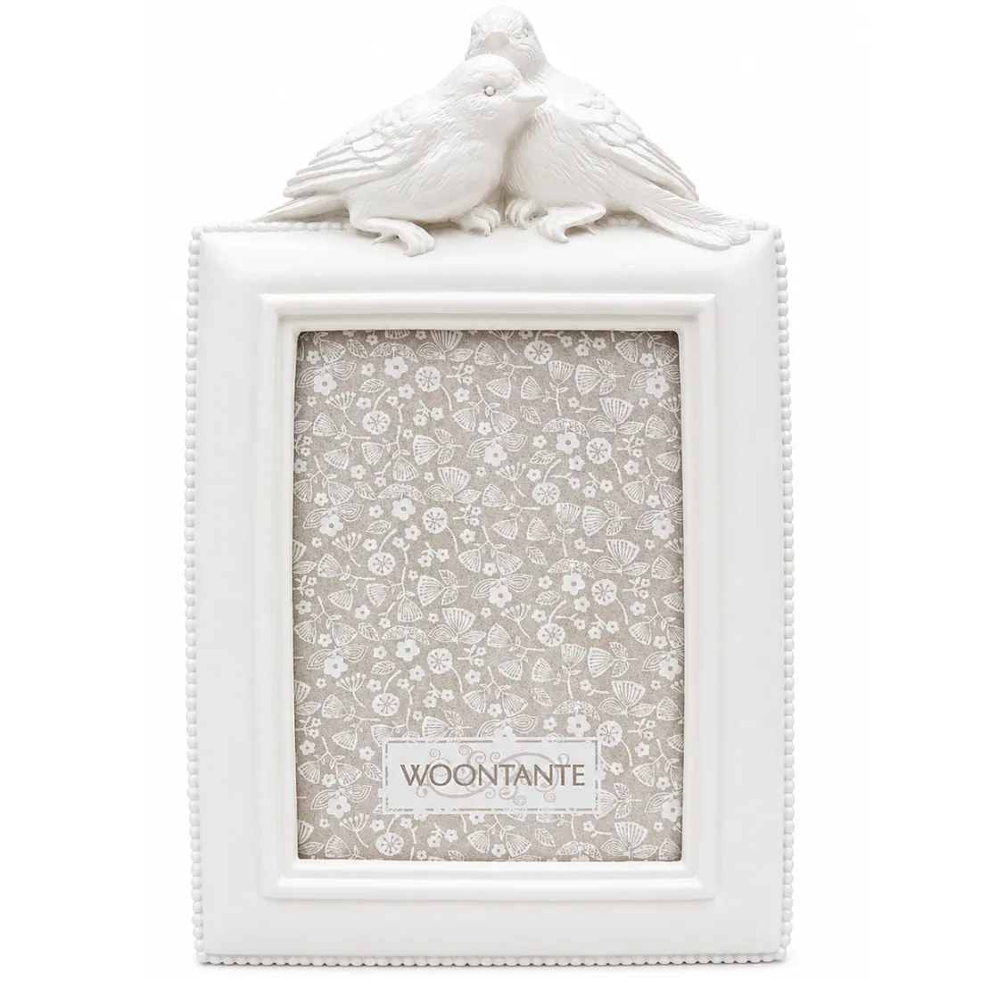 White picture frame with decorative birds on top in a vintage style.