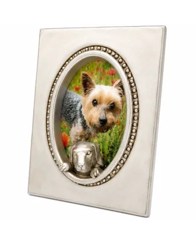 Side view of a dog photo frame in a white finish with a dog figurine.