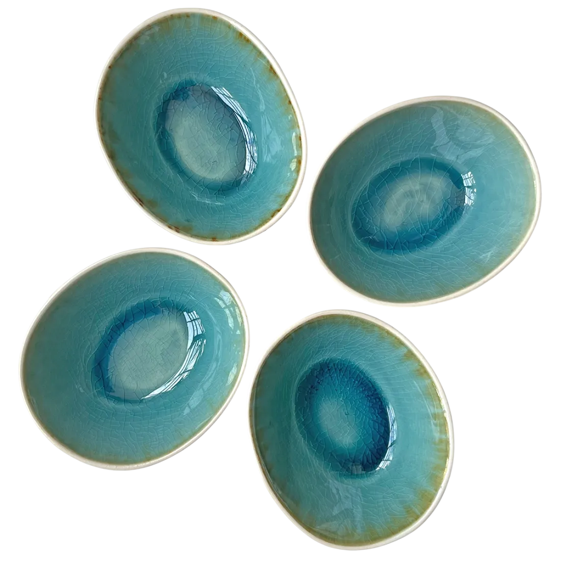Top view of four dipping bowls with crackle glaze interiors.