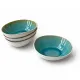 Stack of four dipping bowls with a turquoise glazed interior and white exterior, one bowl separated.