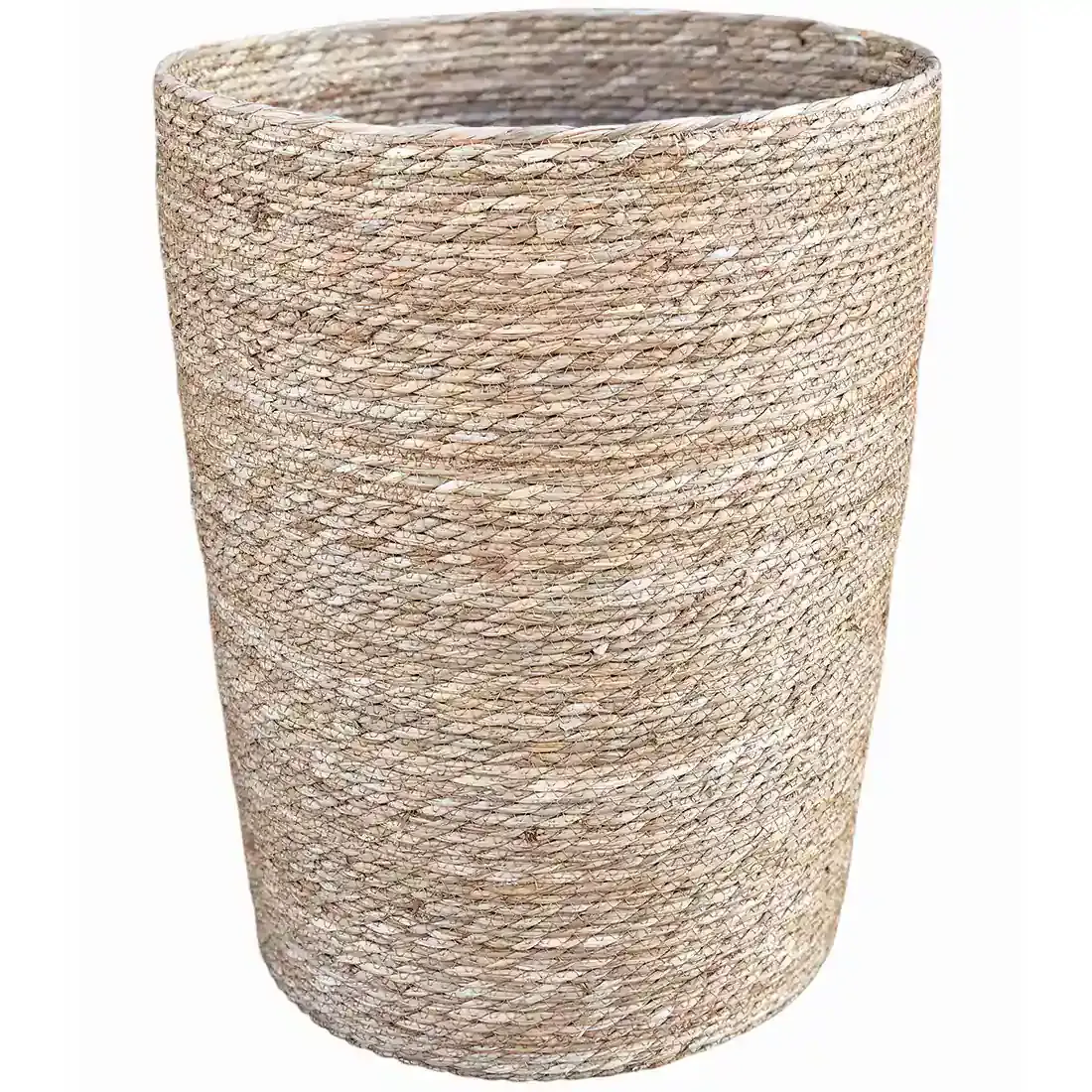 Open rattan laundry basket in a cylindrical shape and a textured, rustic finish.