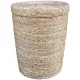 Open rattan laundry basket in a cylindrical shape and a textured, rustic finish.