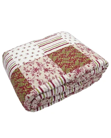 Folded Paisley Delight quilt, showcasing patchwork floral and paisley prints.