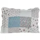 A blue pillowcase showcasing blue and white patchwork and an Oxford scalloped edging.