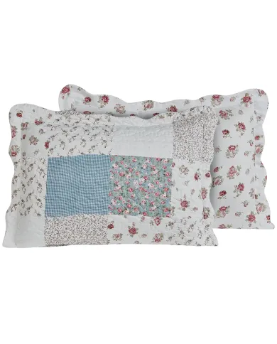Patchwork pillowcase in blue displaying the Cottage Charm coordinating front and back patterns.