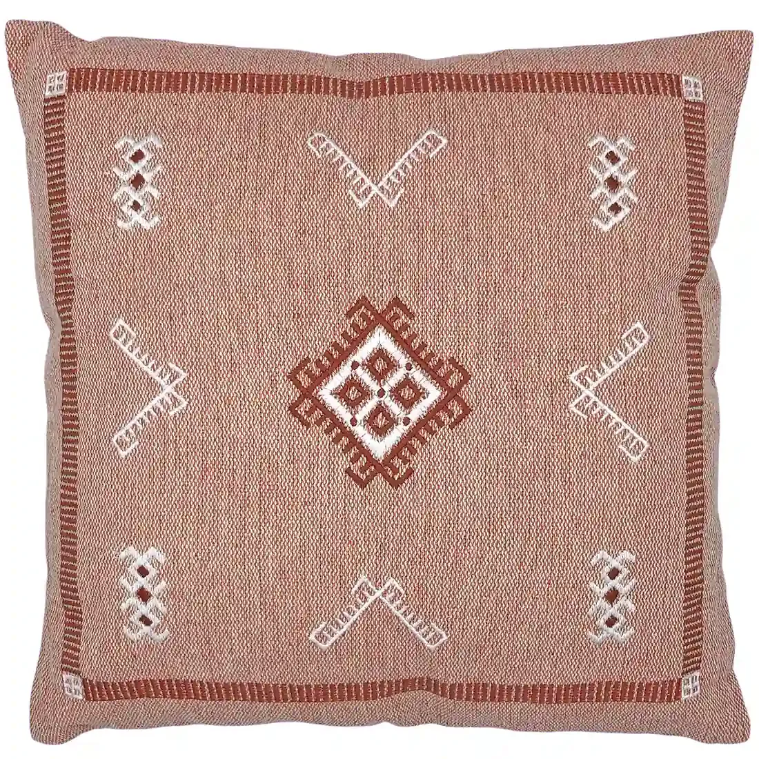 A decorative cushion with embroidered ethnic patterns in terracotta and white tones.