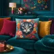 A vibrant decorative cushion featuring a cat adorned with flowers, placed on a teal couch with various textures and patterns.