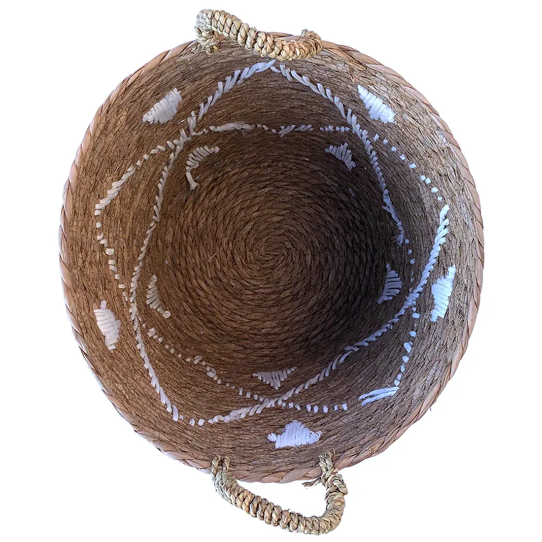 Top view of the embroidered seagrass laundry basket.