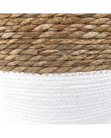 Close up detail of the two-tone seagrass laundry basket.