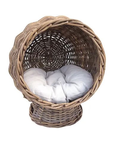 Kubu rattan cat basket with a plush cream cushion inside, offering a stress-free hideaway for cats.