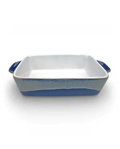 A rectangular single serve oven dish with a glossy white interior and a reactive glaze exterior.