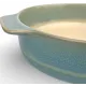 A close-up of a round oven dish high-lighting the reactive glaze finish.