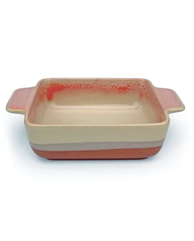 A square oven dish in a reactive glaze of terracotta hues, featuring two curved handles and a smooth interior.